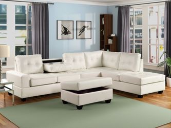 New white sectional and ottoman