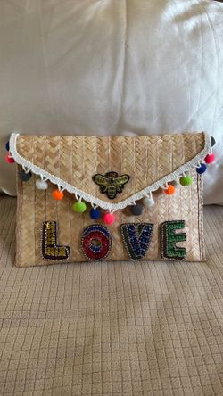 Straw Clutch with Pom Poms & Sequin “LOVE” Design