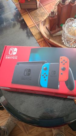 Sellibg USED NINTENDO Switch 1 + 128 GB SD CARD For Sale