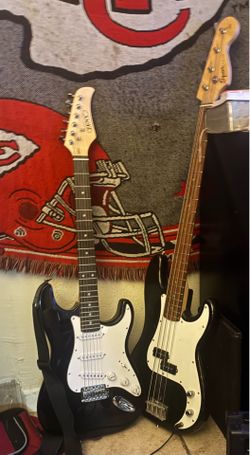 Squire made by fender bass guitar and Zeni guitar