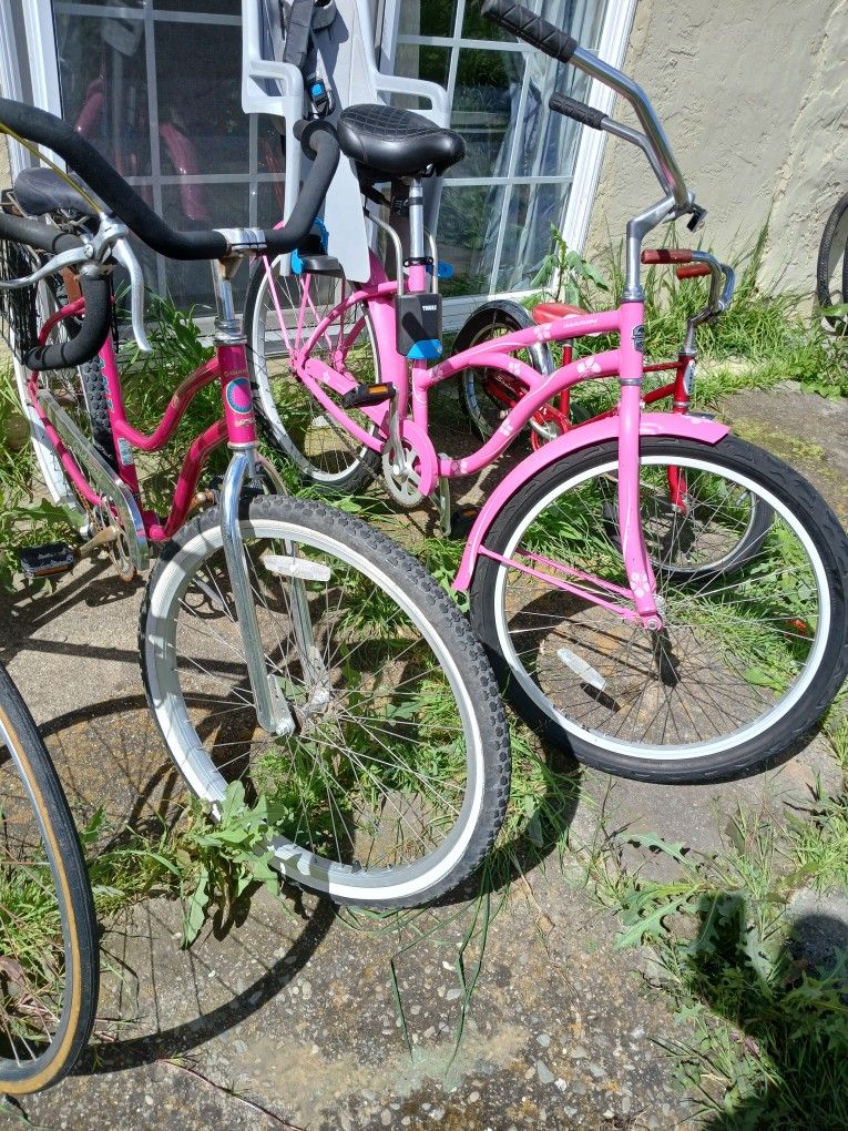 Quality Cruisers One Has Baskets On Has Kid Seat