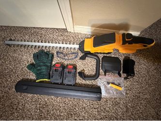 Electric hedge trimmer