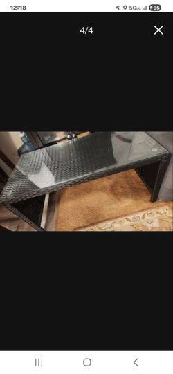 Wicker coffee table with glass top