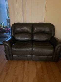 Brown Leather Reclining Loveseat