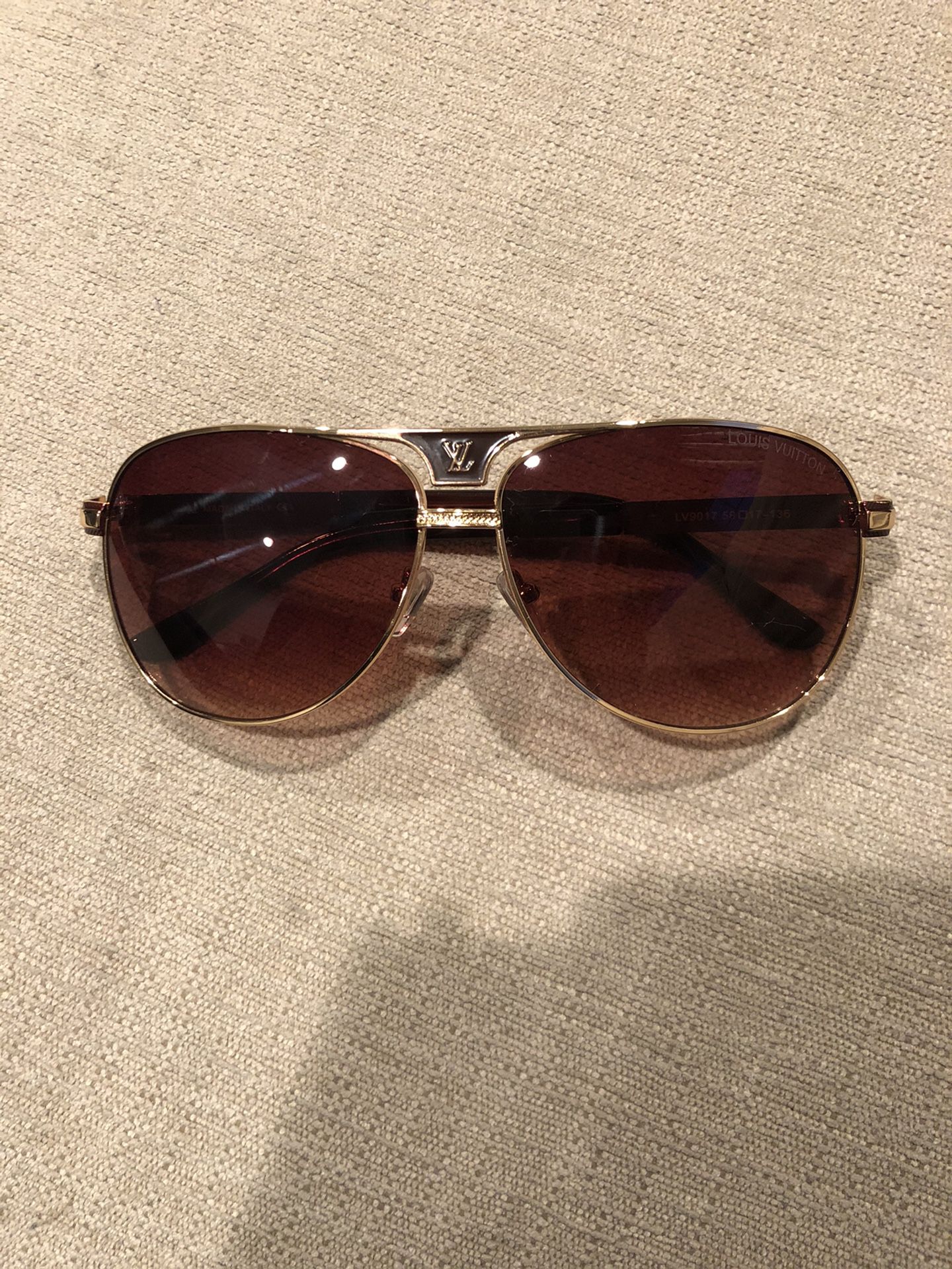 Louis Vuitton sunglasses. Unisex