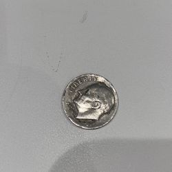 1985-D Error dime.  Struck On Wrong Planchet.  Off Center.