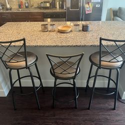 Three Barstools. Swivel And Adjustable Height.