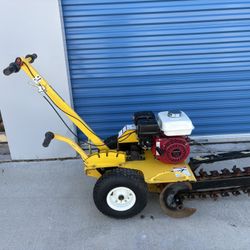 Ground hog trencher 18 inches  very good condition $1999