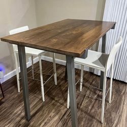 Crate and barrel bar table with stools