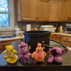 Lot Of Four Pokemon Figurines 