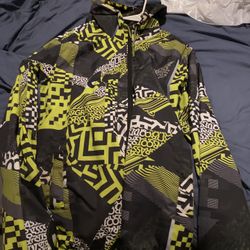 Grassroots XL lightweight jacket. rain and wind style. black green pattern