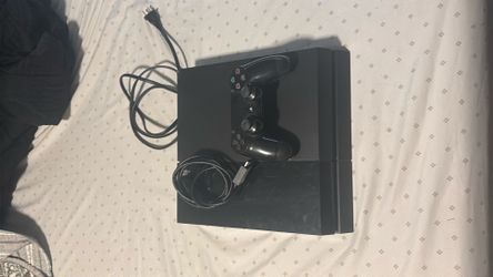 PS4 black with controller and hdmi cable