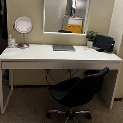 White Desk and Black Chair