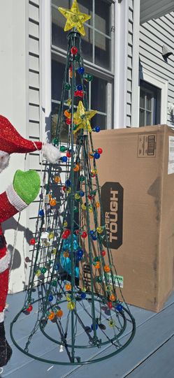 2 outdoor christmas light up trees