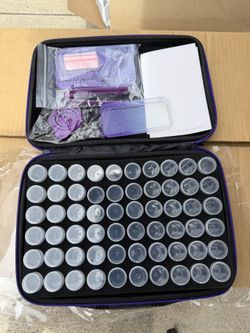 New art accessory case with 60 containers and art tools.