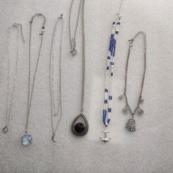 6 silver tone chains in excellent condition, see photos for details.