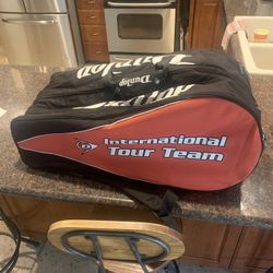 Used Dunlop Back Pack Tennis Racquet Carrier Has 2 Sides For Racquets And A Carrier Stap