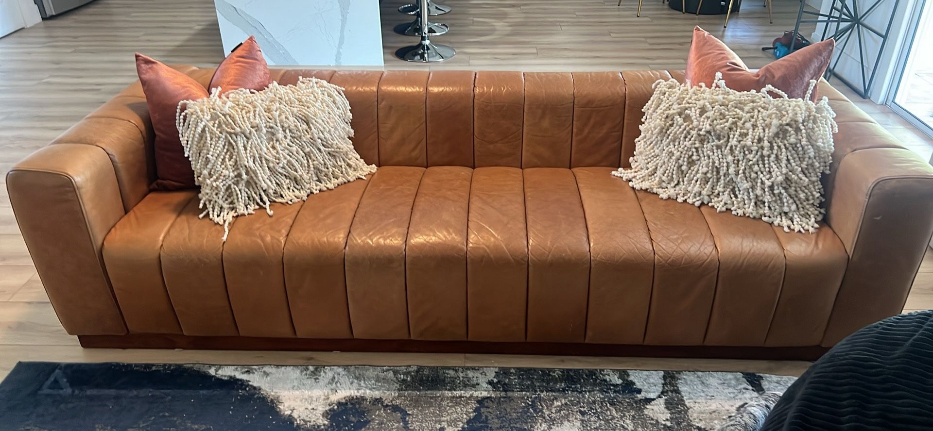 Channeled Leather Sofa With Walnut Base