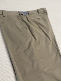 Brand new pair of Van Heusen slacks original price seven dollars size 42 x 30