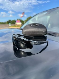 Clear Frame Black Oakleys New