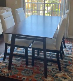 Dinning Table And 4 Cushioned Chairs