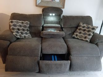 Powered reclining sofa