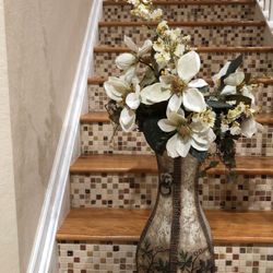 Metal vase with silk white flowers