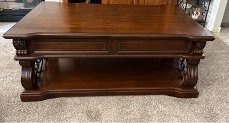 Coffee Table 30in w by 19 in h and can extend upward to 30 in h