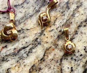 4 1950's 14k gold Pendants and Diamond and one 18" chain