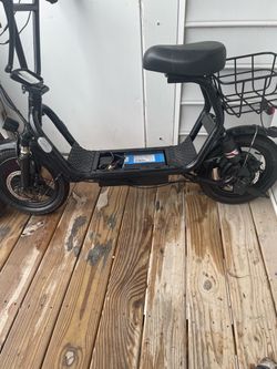 Black Electric Scooter with Seat and Basket