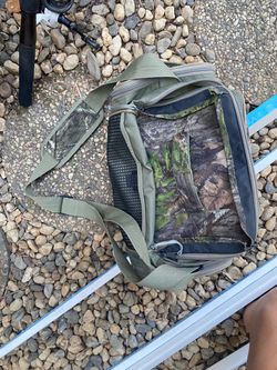 Fishing lures, 2 bags, and tackle boxes