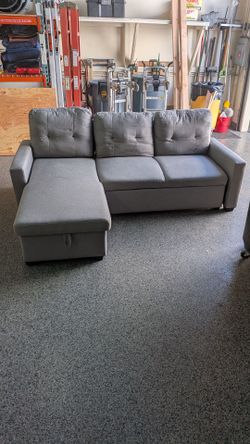 Gray Sectional Sofa with Storage Chaise. First person that picks it up gets it.