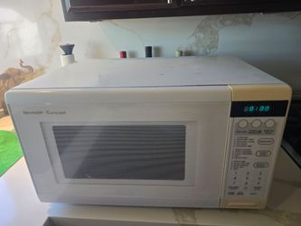 Sharp carousel microwave used condition works good