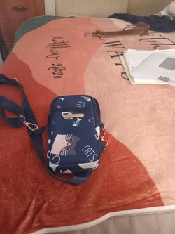 Blue Crossbody bag.