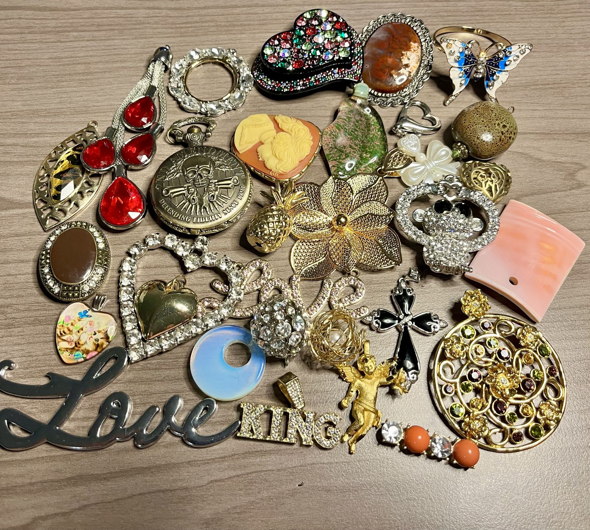 Vintage  Pendants and trinkets. These pendants and trinkets are small. As is. No returns. What you see is what you get. Make me an offer I can’t refus