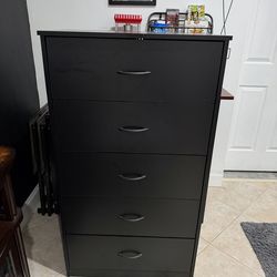 Black 6 drawer dresser, just over 4 feet high.