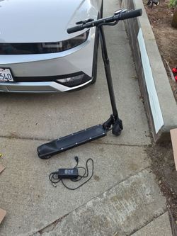 Ecoreco s3 electric scooter w/ charger selling as is needs work