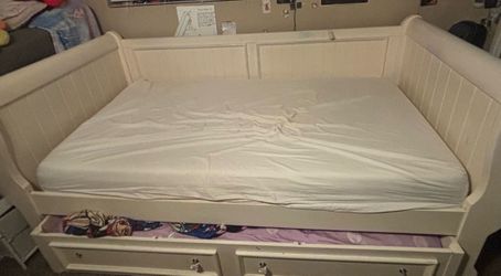 bed with pull out underneath