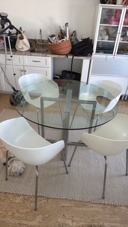 Cb2 glass table with 4 chairs