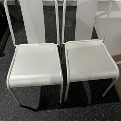 2 Metal Stacking Dining Chairs