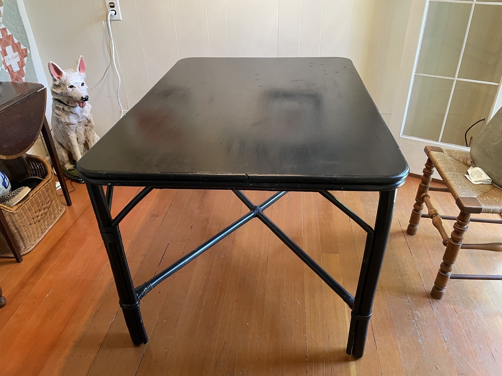 FOR SALE! 50’s black painted bamboo dining/kitchen table, seats 4-6, good condition 35w x 48l x 30h $60