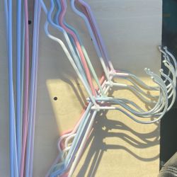 Pastel-colored hangers for small clothes like tank tops and sportswear. And circle hangers for scarves or light clothes.