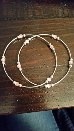 Pair of silver and pink beaded bracelet