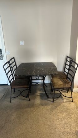 Marble dining table set with chairs