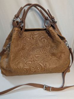 Embossed tan purse