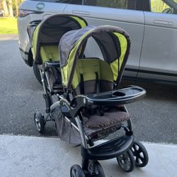 Double Stroller With Attached Back For Standing Toddler.  (Sit N Stand)