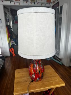 Cream colored textured lampshade.