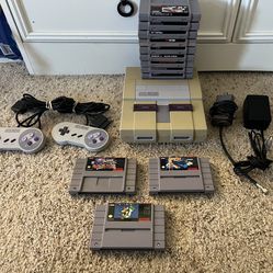 Nintendo SNES Super Nintendo Bundle with two controllers and games