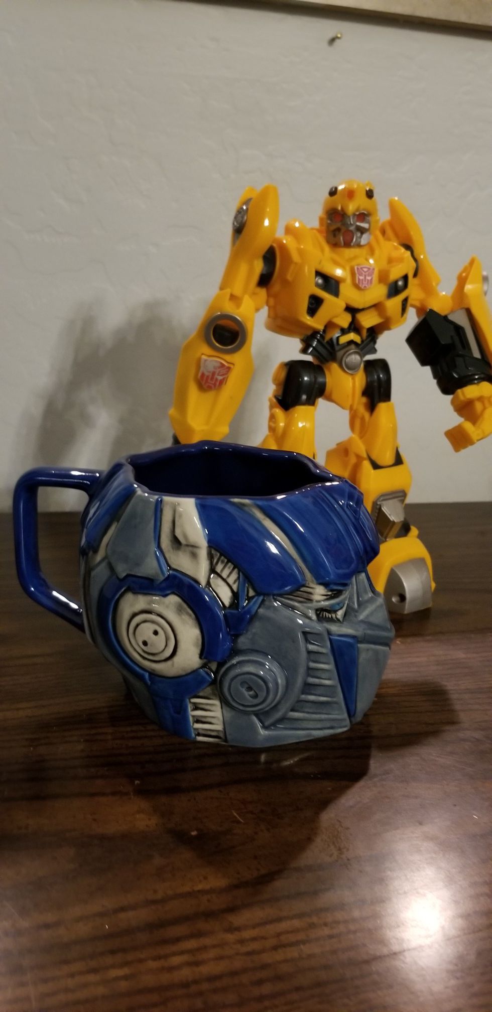 Bumble Bee toy and Optimus Prime ceramic mug- Universal Studios 2012 collectable