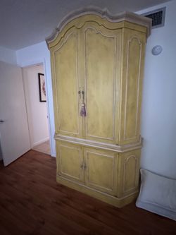 Antique painted armoire